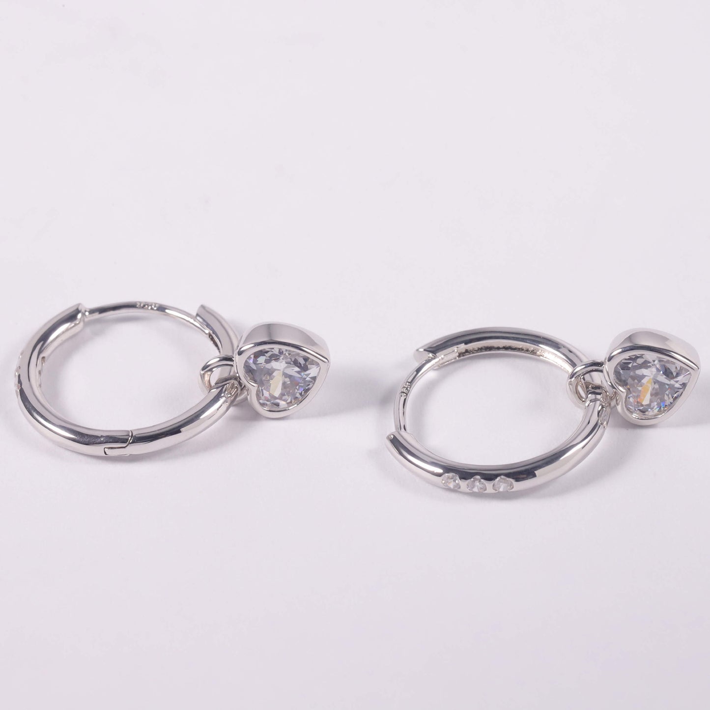 Elysian huggie hoops (rhodium plated)