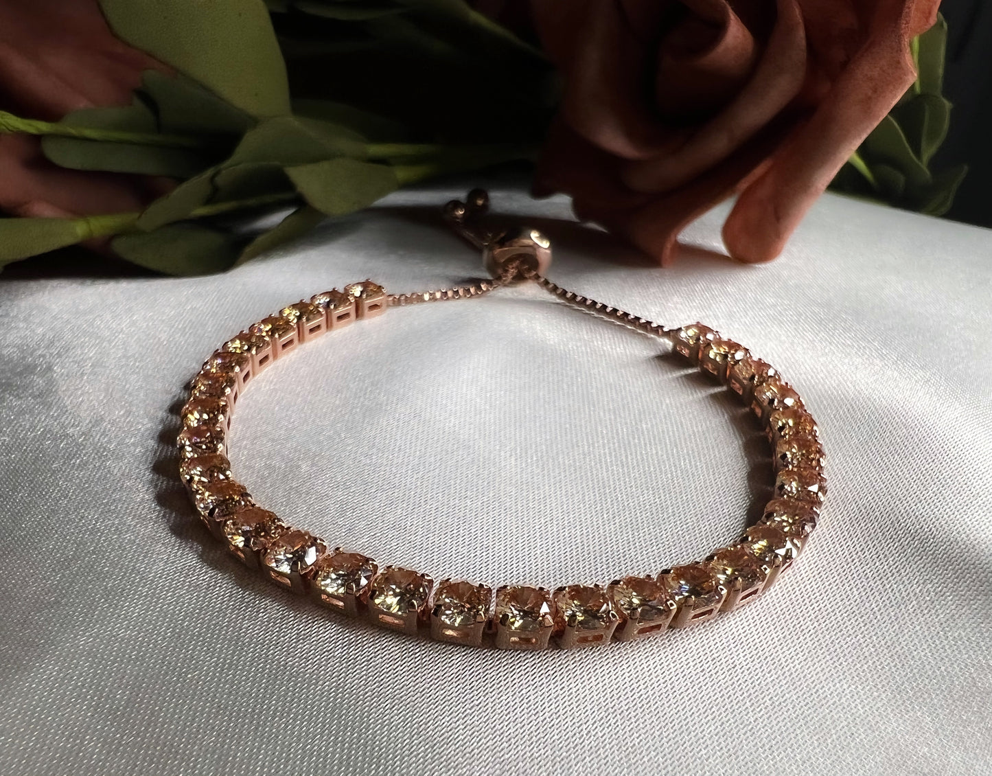 Glistening Glider bracelet- 18k gold plated (Rose Gold) with champagne crystals