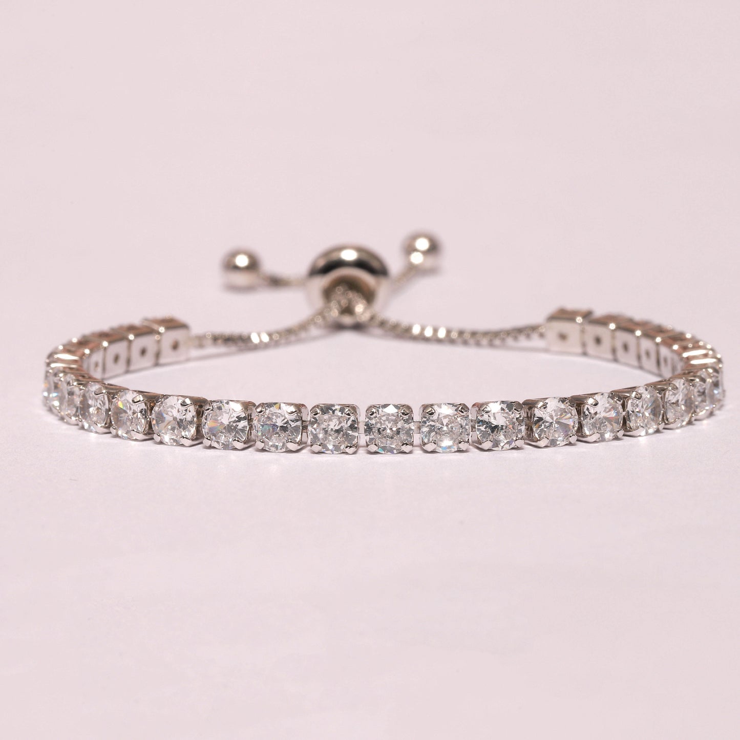 Glistening Glider bracelet- Rhodium plated with white crystals